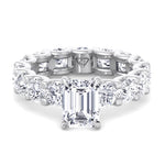 emerald-cut-diamond-eternity-ring-with-round-side-stones-solid-white-gold