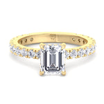 emerald-cut-diamond-engagement-ring-with-hidden-halo-and-side-stones-yellow-gold