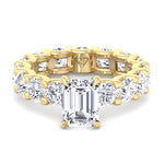 emerald-cut-diamond-eternity-ring-with-round-side-stones-solid-yellow-gold