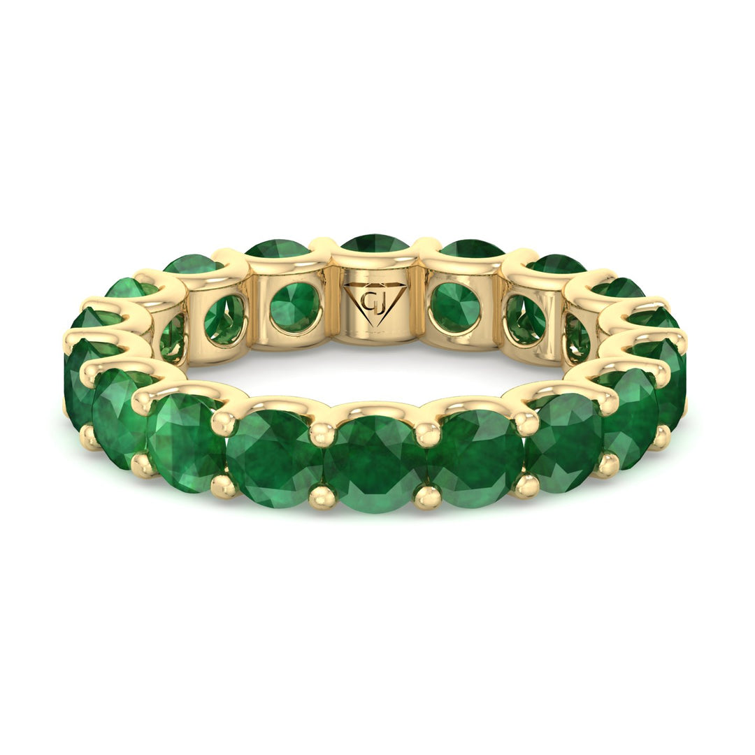 round-cut-green-emerald-eternity-band-in-solid-yellow-gold