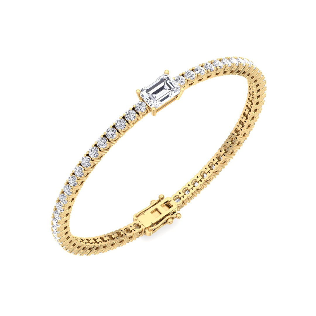emerald-cut-center-stone-diamond-tennis-bracelet-solid-yellow-gold