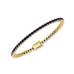 4-prong natural blue sapphire tennis bracelet 14K yellow gold