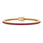 4-prong red ruby tennis bracelet 14K yellow gold