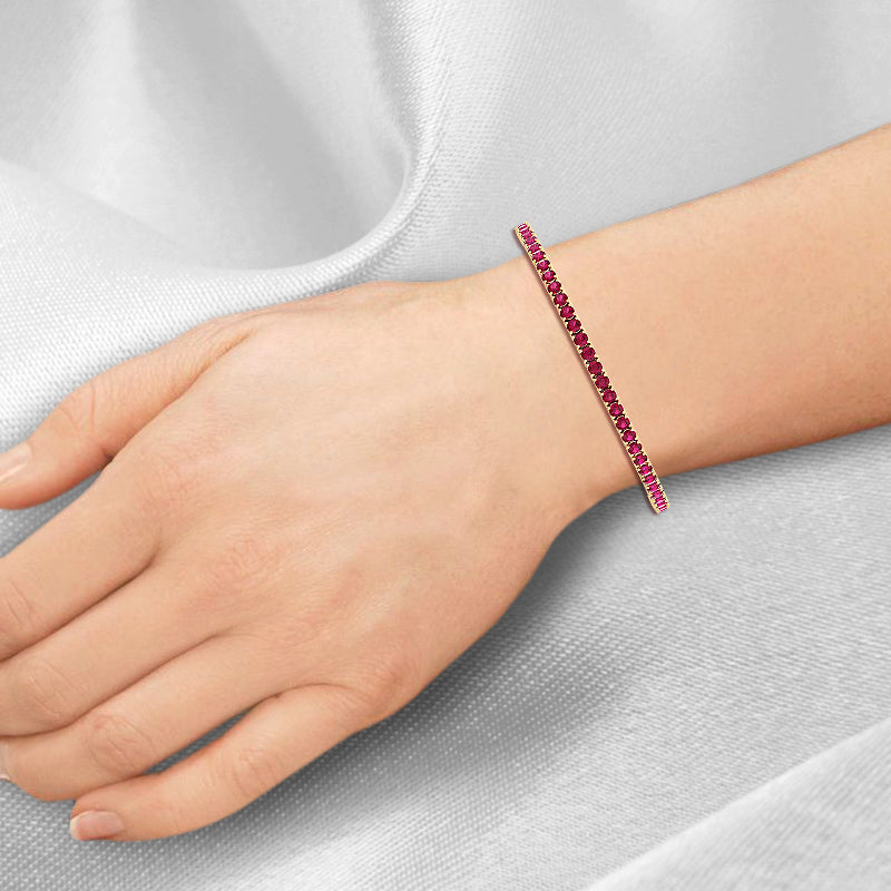 4-prong natural red ruby tennis bracelet 3CT 14K yellow gold
