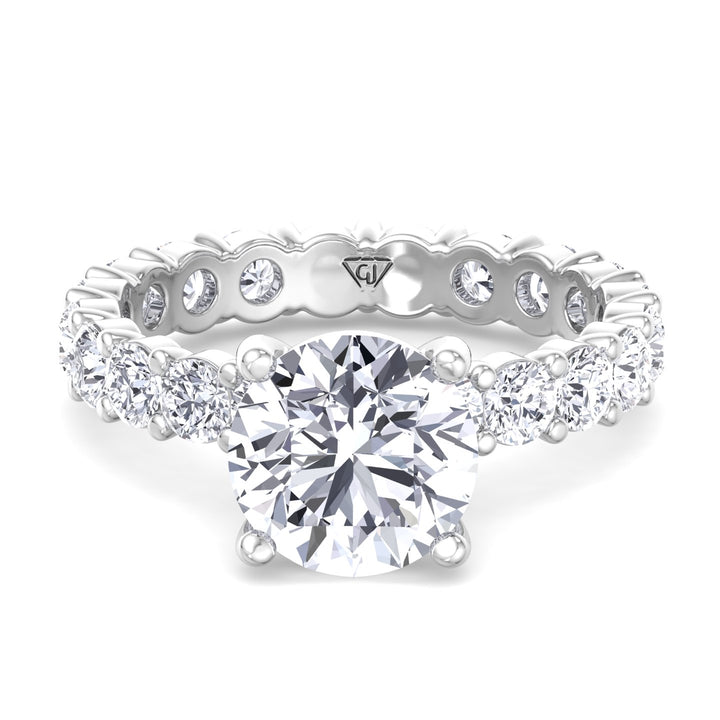 round-cut-diamond-eternity-style-engagement-ring-in-18k-white-gold