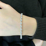 pear-shape-prong-setting-east-to-west-diamond-tennis-bracelet-in-18k-white-gold