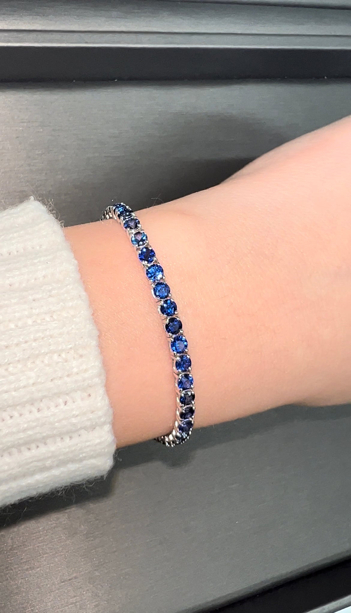 Four-prong round blue sapphire tennis bracelet 14K gold