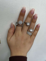 round-cut-diamond-with-halo-engagement-rings-14k-white-gold-and-diamond-eternity-bands