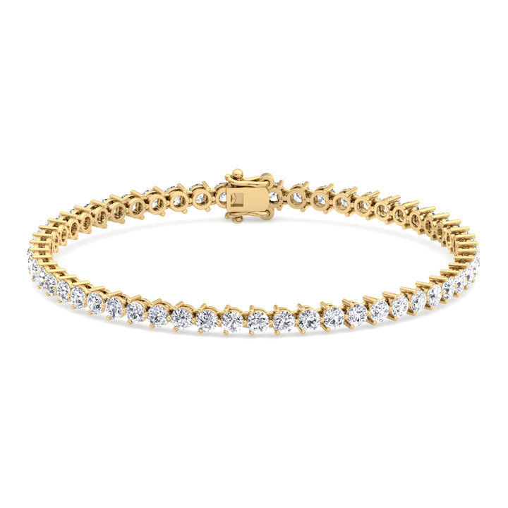 3-prong-martini-style-diamond-tennis-bracelet-in-yellow-gold
