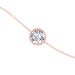 Round cut bezel set diamond solitaire bracelet 14K gold