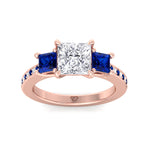 3.20-c-t-w-princess-cut-diamond-engagement-ring-with-blue-sapphire-sidestones-in-rose-gold 
