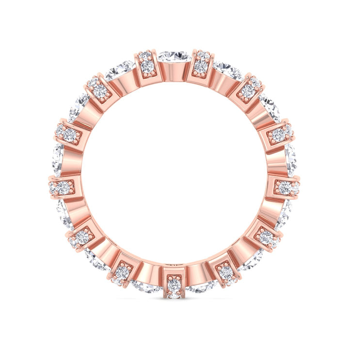 round-cut-diamond-in-a-bar-set-eternity-band-with-pave-accents-in-rose-gold-band