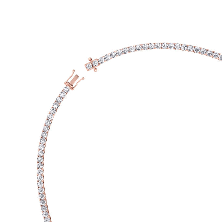 classic-diamond-tennis-necklace-with-emerald-cut-diamond-center-stone-in-rose-gold