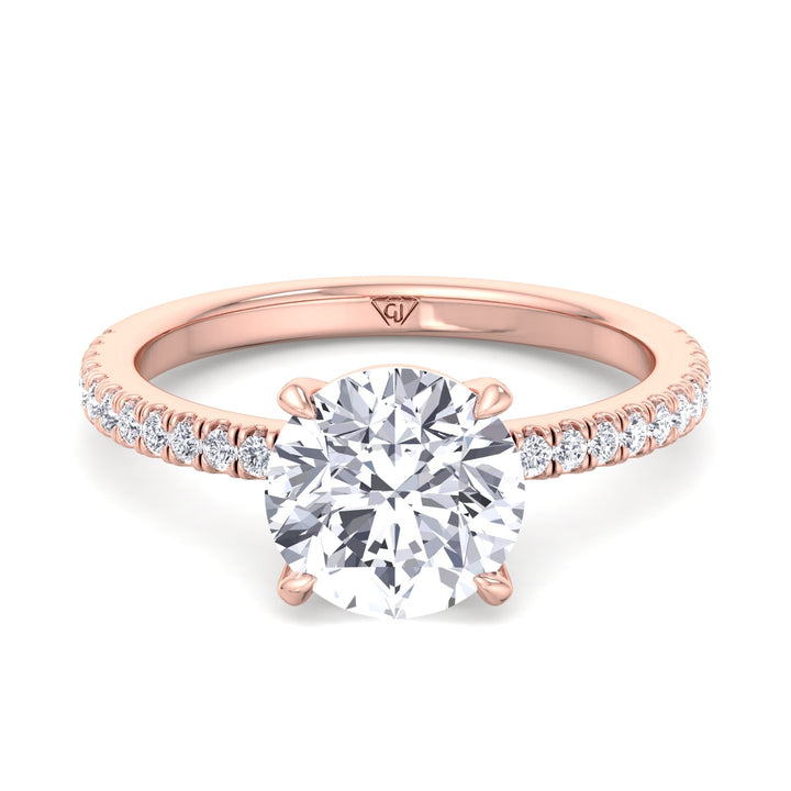 round-cut-diamond-ring-with-sidestones-solid-rose-gold