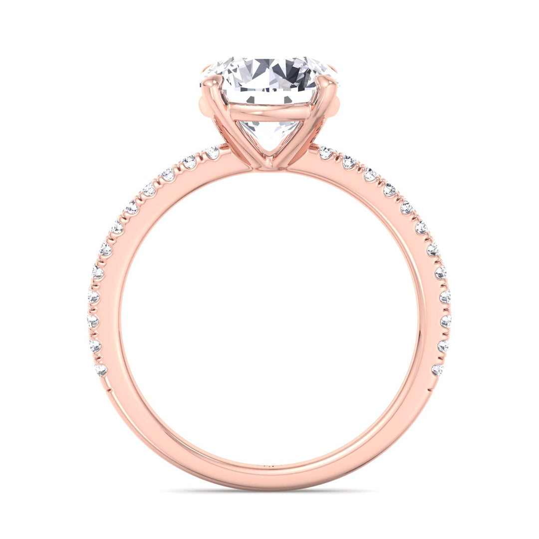 round-cut-diamond-ring-with-sidestones-rose-gold