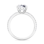 round-cut-diamond-ring-with-sidestones-in-white-gold