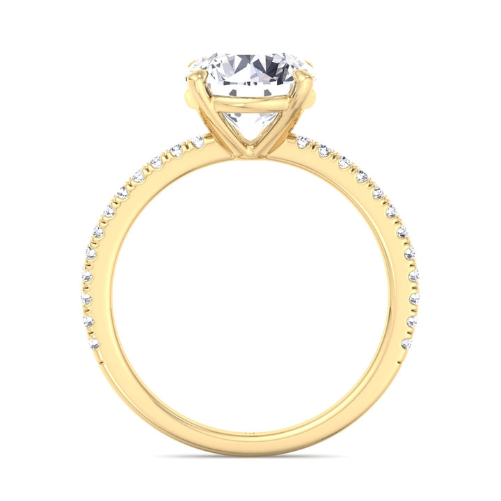 round-cut-diamond-ring-with-sidestones-yellow-gold