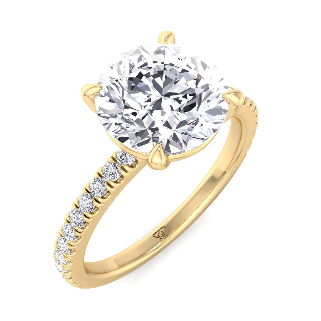 round-cut-diamond-ring-with-sidestones-solid-yellow-gold