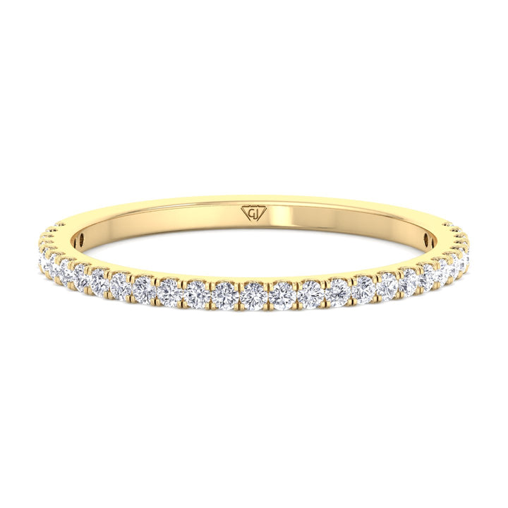 0.25-carat-round-cut-diamond-dainty-band-in-yellow-gold