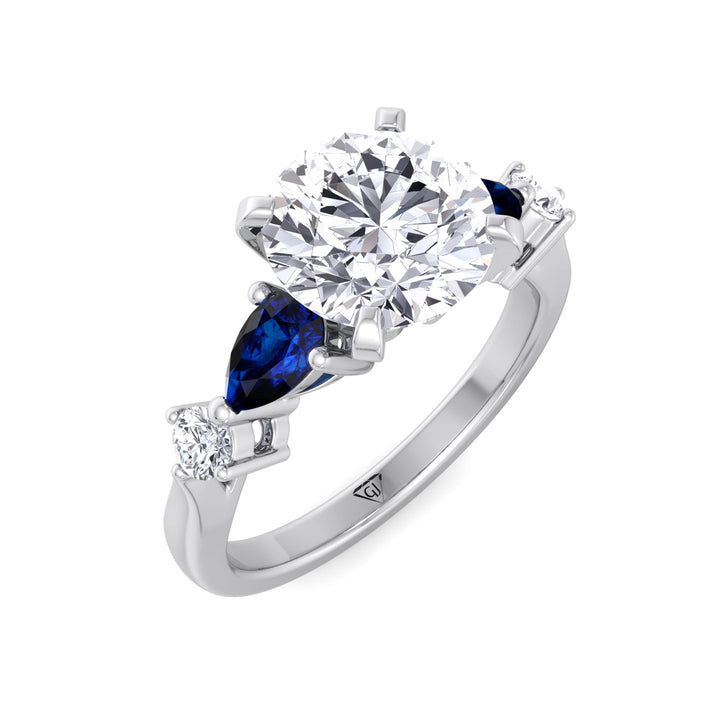 2-57ctw-round-cut-diamond-engagement-ring-with-blue-sapphire-pear-shape-sidestones-in-solid-white-gold