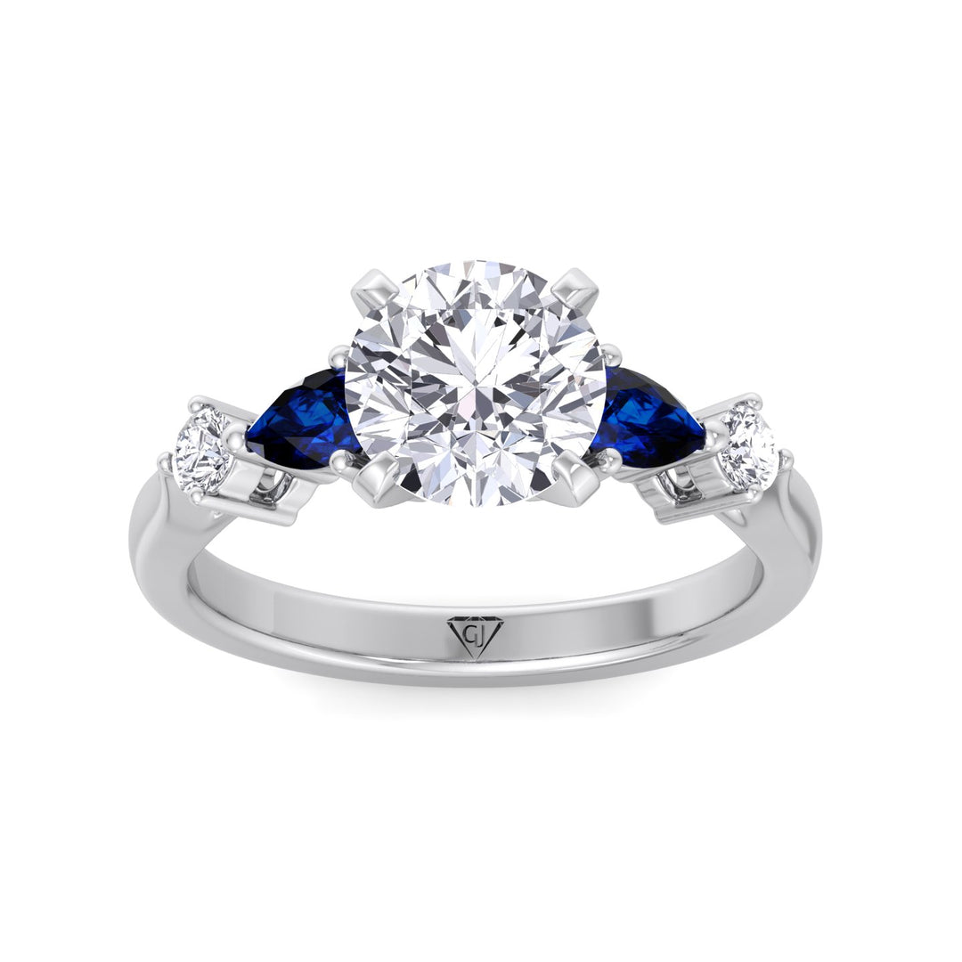  2-57ct-t-w-round-cut-diamond-engagement-ring-with-blue-sapphire-pear-shape-sidestones-in-solid-white-gold