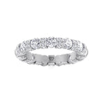 round-cut-diamond-in-a-bar-set-eternity-band-with-pave-accents-in-white-gold