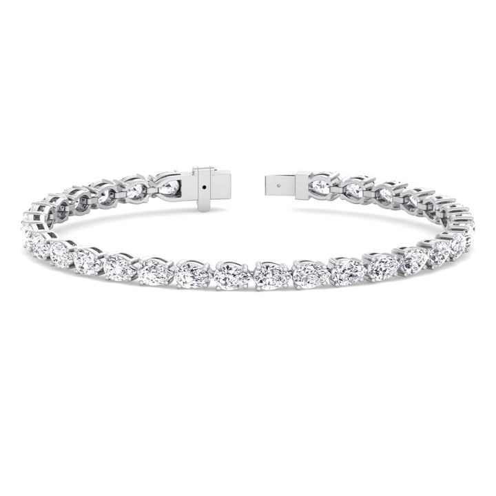 pear-shape-east-to-west-diamond-tennis-bracelet-solid-white-gold