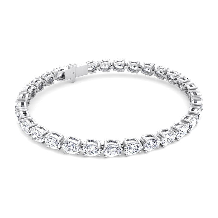 pear-shape-prong-setting-east-to-west-diamond-tennis-bracelet-in-solid-white-gold