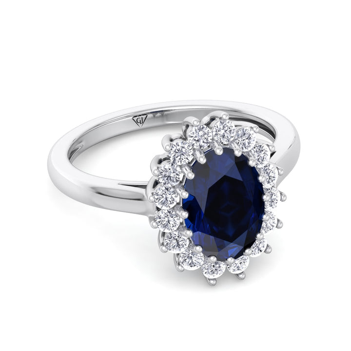 oval-cut-blue-sapphire-with-round-diamond-halo-engagement-ring-in-white-gold