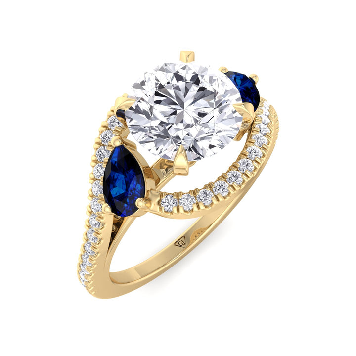 2.85ctw-round-cut-diamond-engagement-ring-with-halo-and-blue-sapphire-pear-shape-sidestones-in-solid-yellow-gold