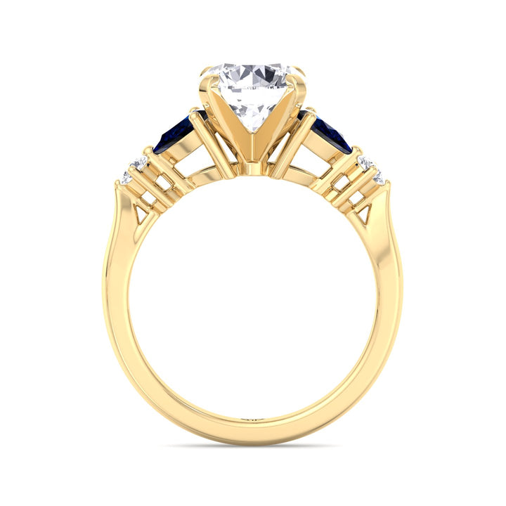round-cut-diamond-engagement-ring-with-blue-sapphire-pear-shape-sidestones-in-yellow-gold