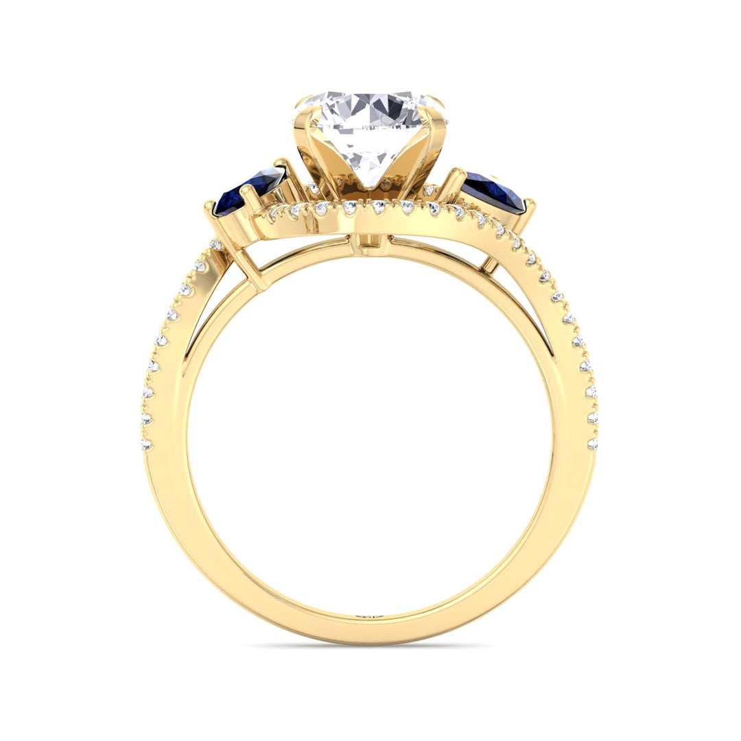 round-cut-diamond-engagement-ring-with-halo-blue-sapphire-pear-shape-sidestones-in-solid-yellow-gold