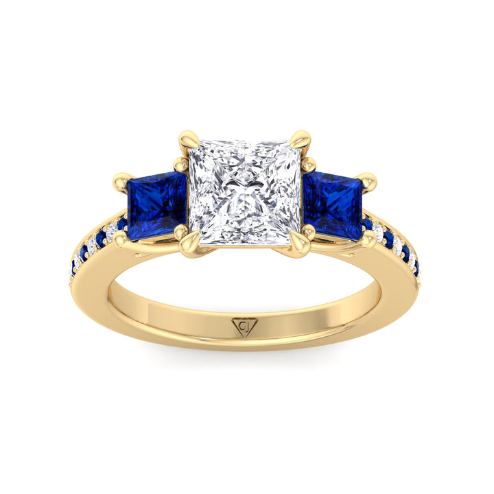 3-20-c-t-w-princess-cut-diamond-engagement-ring-with-blue-sapphire-sidestones-in-yellow-gold 