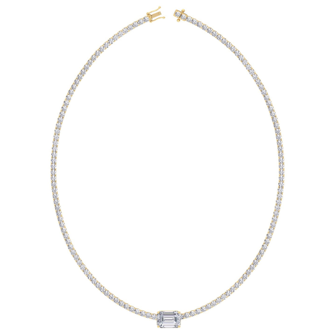 classic-diamond-tennis-necklace-with-emerald-cut-diamond-center-stone-in-yellow-gold