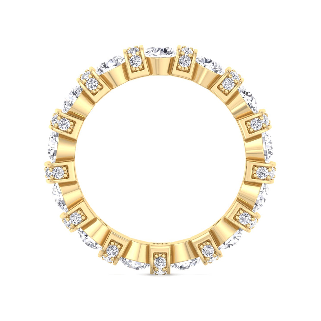 round-cut-diamond-in-a-bar-set-eternity-band-with-pave-accents-in-solid-yellow-gold-band