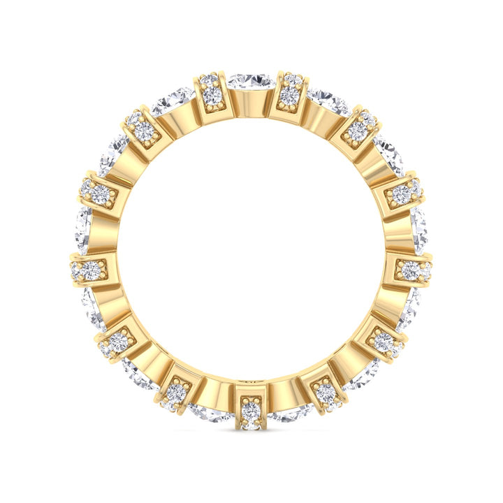 round-cut-diamond-in-a-bar-set-eternity-band-with-pave-accents-in-solid-yellow-gold-band