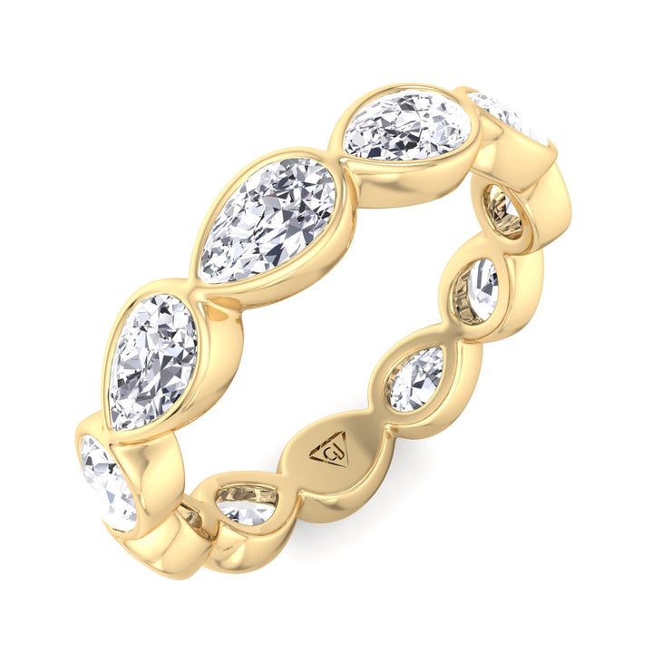 east-to-west-style-bezel-set-pear-shape-diamond-eternity-band-in-yellow-gold