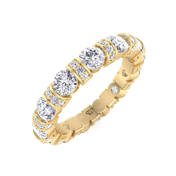 round-cut-diamond-bar-set-eternity-band-with-pave-accents-in-solid-yellow-gold