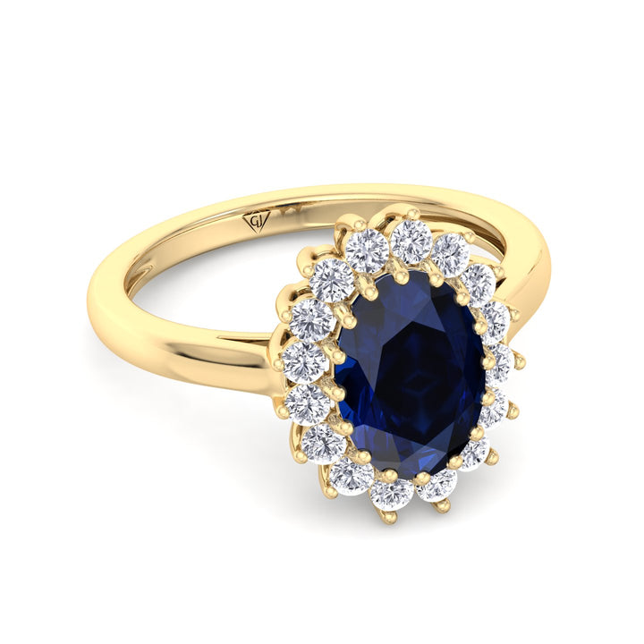 oval-cut-blue-sapphire-halo-diamond-engagement-ring-in-yellow-gold