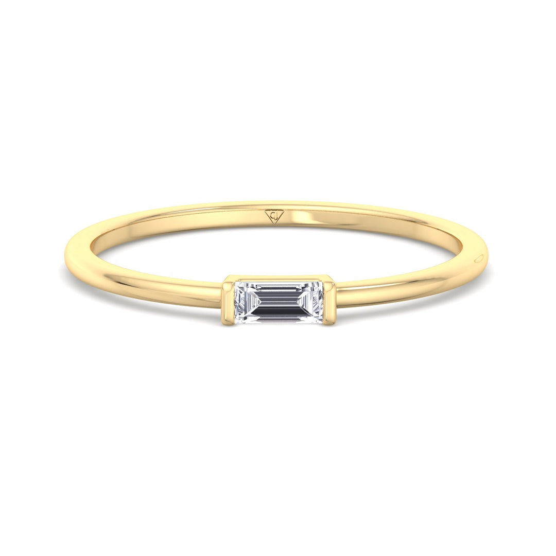 dainty-baguette-diamond-solitaire-stackable-ring-in-yellow-gold-band