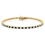 Round cut black and white diamond tennis bracelet 14K yellow gold