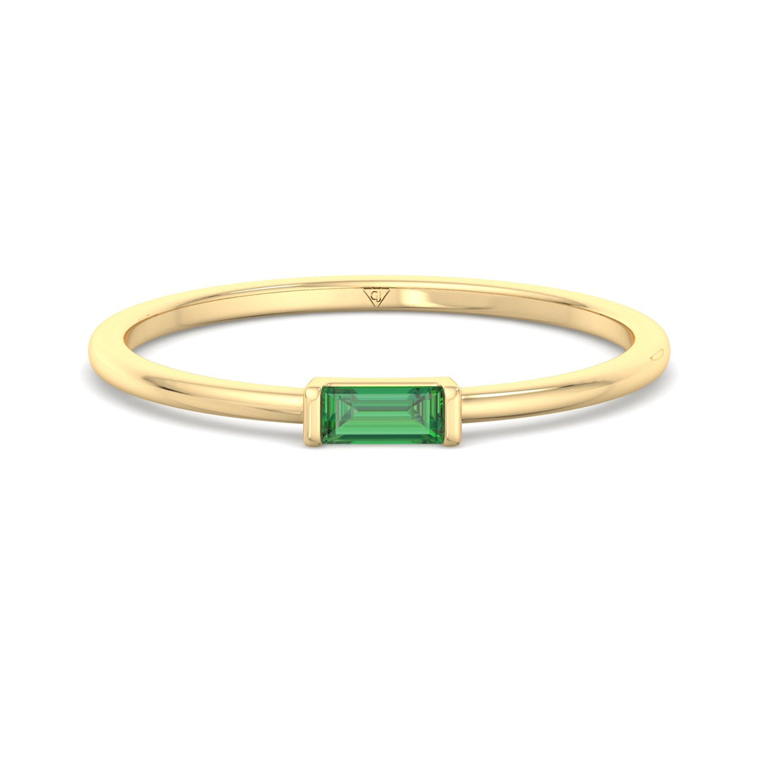  dainty-green-emerald-baguette-solitaire-stackable-ring-in-yellow-gold