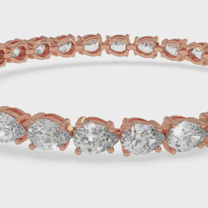 pear-shape-prong-setting-east-to-west-diamond-tennis-bracelet-in-14k-rose-gold